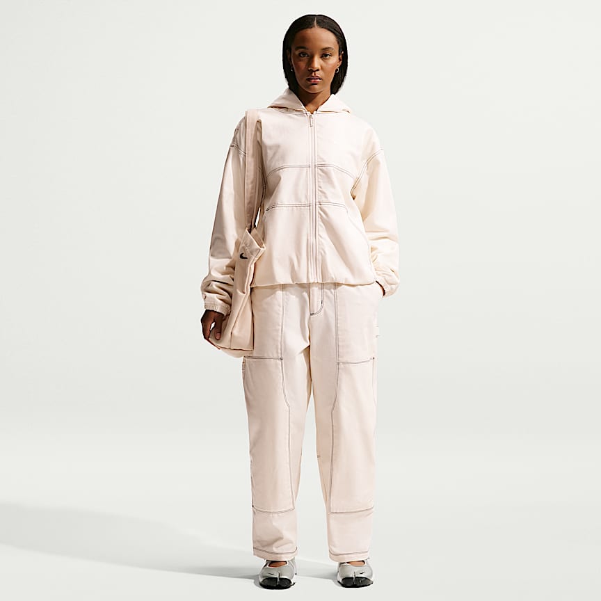 Nike Sportswear Windrunner Women's Mid-Rise Slim Knit Pants. Nike.com